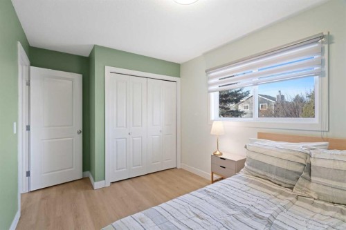 53 Riverside Crescent Se, Calgary, AB - Indoor Photo Showing Bedroom