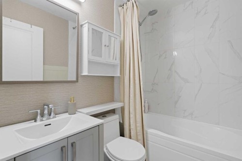 53 Riverside Crescent Se, Calgary, AB - Indoor Photo Showing Bathroom