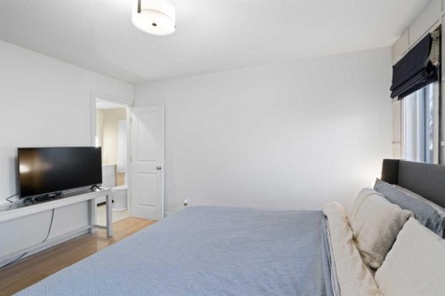 53 Riverside Crescent Se, Calgary, AB - Indoor Photo Showing Bedroom