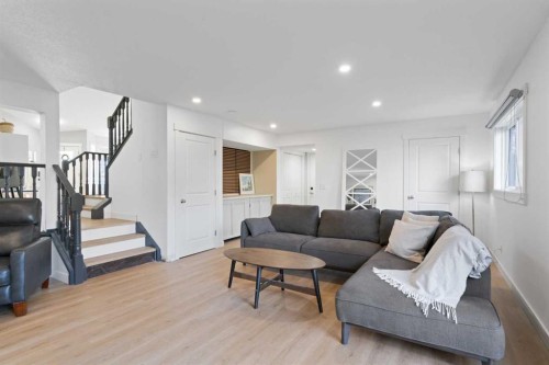 53 Riverside Crescent Se, Calgary, AB - Indoor Photo Showing Living Room