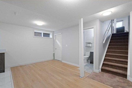 53 Riverside Crescent Se, Calgary, AB - Indoor Photo Showing Other Room