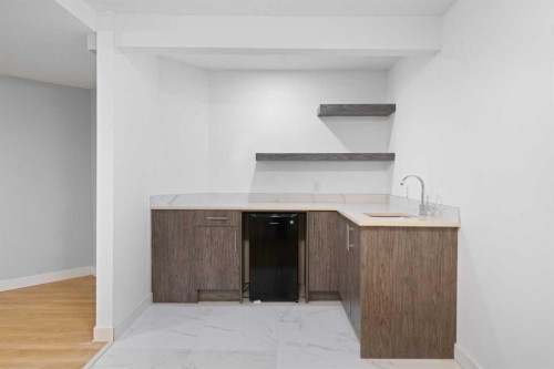 53 Riverside Crescent Se, Calgary, AB - Indoor Photo Showing Other Room