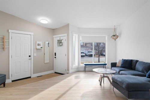 53 Riverside Crescent Se, Calgary, AB - Indoor Photo Showing Living Room