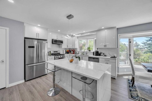 303 Ranchridge Bay Nw, Calgary, AB - Indoor Photo Showing Kitchen With Stainless Steel Kitchen With Upgraded Kitchen
