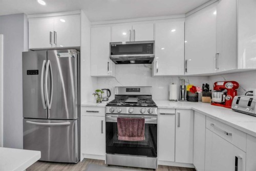 303 Ranchridge Bay Nw, Calgary, AB - Indoor Photo Showing Kitchen