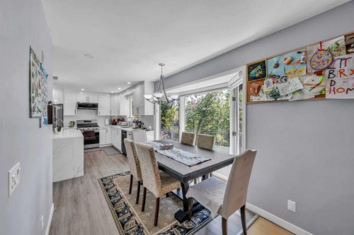 303 Ranchridge Bay Nw, Calgary, AB - Indoor Photo Showing Dining Room