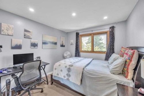 303 Ranchridge Bay Nw, Calgary, AB - Indoor Photo Showing Bedroom