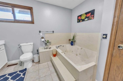 303 Ranchridge Bay Nw, Calgary, AB - Indoor Photo Showing Bathroom