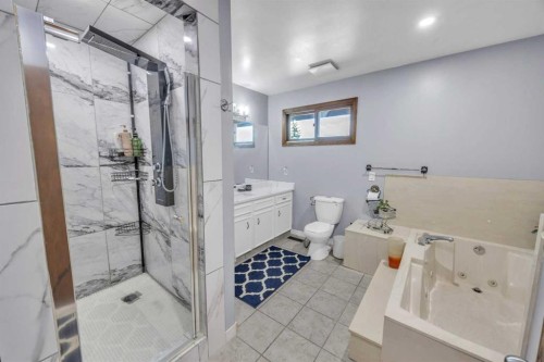 303 Ranchridge Bay Nw, Calgary, AB - Indoor Photo Showing Bathroom