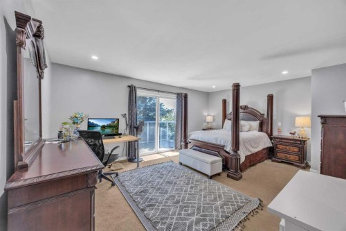303 Ranchridge Bay Nw, Calgary, AB - Indoor Photo Showing Bedroom
