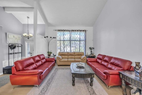 303 Ranchridge Bay Nw, Calgary, AB - Indoor Photo Showing Living Room