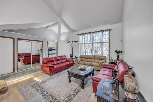 303 Ranchridge Bay Nw, Calgary, AB - Indoor Photo Showing Living Room