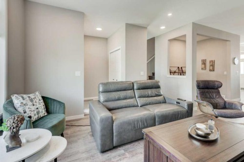 100 Dawson Drive, Chestermere, AB - Indoor Photo Showing Living Room