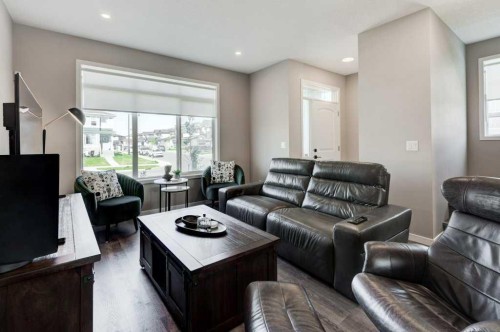 100 Dawson Drive, Chestermere, AB - Indoor Photo Showing Living Room