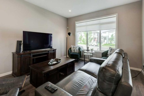 100 Dawson Drive, Chestermere, AB - Indoor Photo Showing Living Room