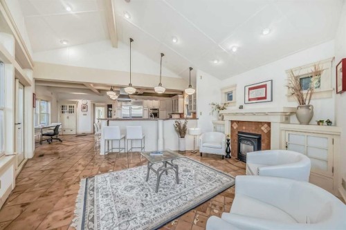 342 Superior Avenue Sw, Calgary, AB - Indoor Photo Showing Living Room With Fireplace