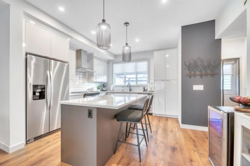 159 Wolf Hollow Park Se, Calgary, AB - Indoor Photo Showing Kitchen With Stainless Steel Kitchen With Upgraded Kitchen