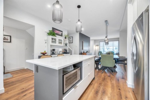 159 Wolf Hollow Park Se, Calgary, AB - Indoor Photo Showing Kitchen With Upgraded Kitchen