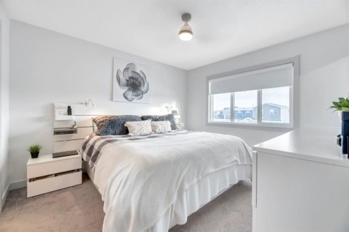 159 Wolf Hollow Park Se, Calgary, AB - Indoor Photo Showing Bedroom