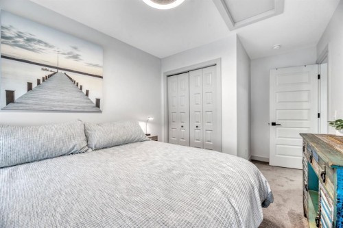159 Wolf Hollow Park Se, Calgary, AB - Indoor Photo Showing Bedroom