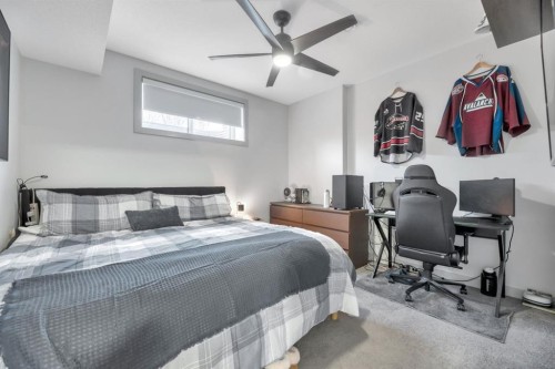 159 Wolf Hollow Park Se, Calgary, AB - Indoor Photo Showing Bedroom