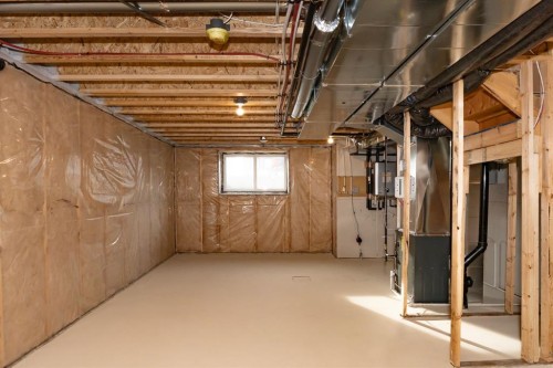 522 Lucas Boulevard Nw, Calgary, AB - Indoor Photo Showing Basement