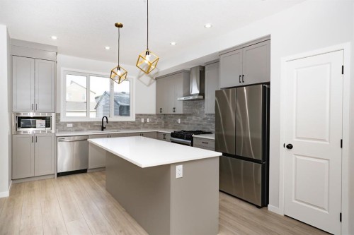 522 Lucas Boulevard Nw, Calgary, AB - Indoor Photo Showing Kitchen With Stainless Steel Kitchen With Upgraded Kitchen
