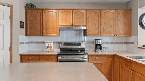 227 Rocky Ridge Close Nw, Calgary, AB - Indoor Photo Showing Kitchen