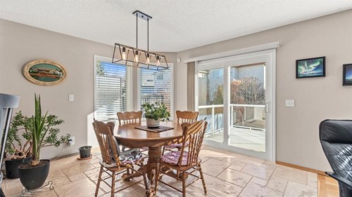 227 Rocky Ridge Close Nw, Calgary, AB - Indoor Photo Showing Dining Room