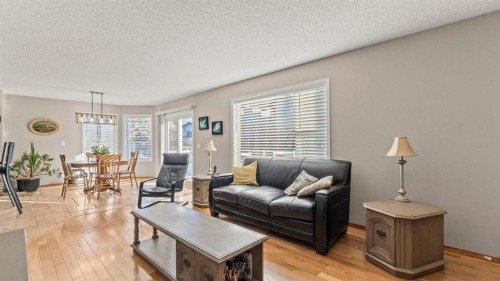 227 Rocky Ridge Close Nw, Calgary, AB - Indoor Photo Showing Living Room