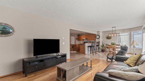 227 Rocky Ridge Close Nw, Calgary, AB - Indoor Photo Showing Living Room