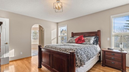 227 Rocky Ridge Close Nw, Calgary, AB - Indoor Photo Showing Bedroom