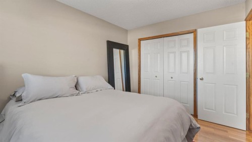 227 Rocky Ridge Close Nw, Calgary, AB - Indoor Photo Showing Bedroom