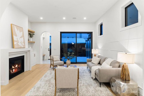 1904 48 Avenue Sw, Calgary, AB - Indoor Photo Showing Living Room With Fireplace