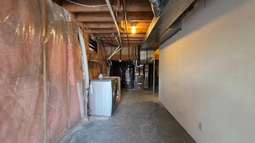 257 Macewan Glen Drive Nw, Calgary, AB - Indoor Photo Showing Basement