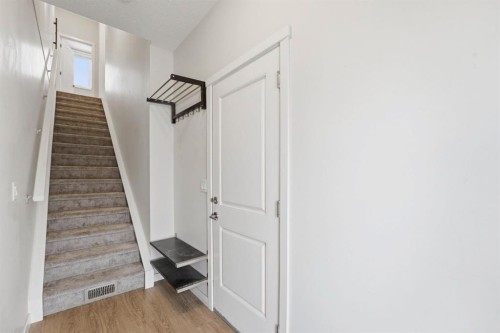 84 Shawnee Common Sw, Calgary, AB - Indoor Photo Showing Other Room