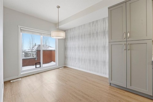 84 Shawnee Common Sw, Calgary, AB - Indoor Photo Showing Other Room