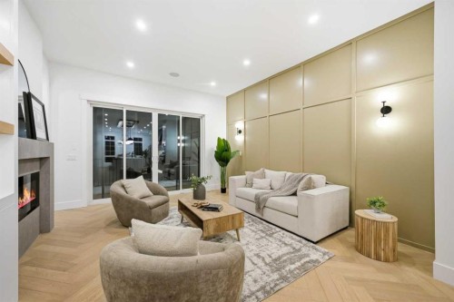 2019 21 Avenue Nw, Calgary, AB - Indoor Photo Showing Living Room With Fireplace