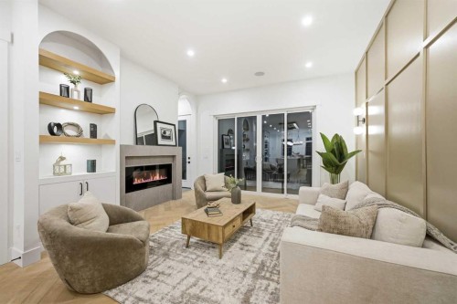 2019 21 Avenue Nw, Calgary, AB - Indoor Photo Showing Living Room With Fireplace