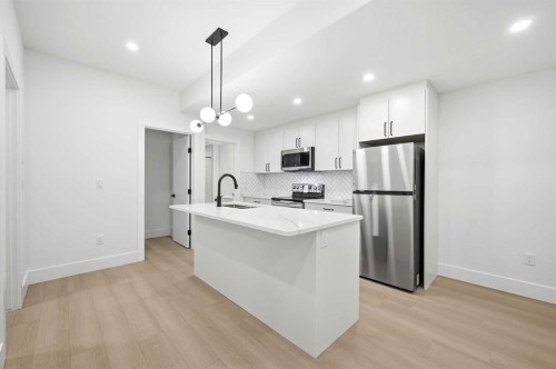 2019 21 Avenue Nw, Calgary, AB - Indoor Photo Showing Kitchen With Stainless Steel Kitchen With Upgraded Kitchen
