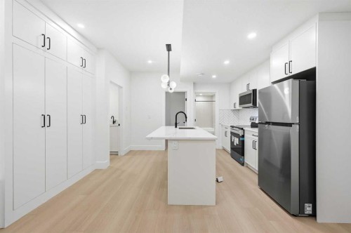 2019 21 Avenue Nw, Calgary, AB - Indoor Photo Showing Kitchen With Stainless Steel Kitchen