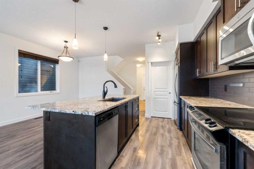51 Legacy Close Se, Calgary, AB - Indoor Photo Showing Kitchen With Upgraded Kitchen