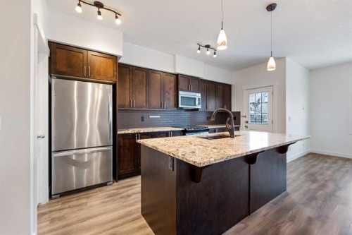 51 Legacy Close Se, Calgary, AB - Indoor Photo Showing Kitchen With Stainless Steel Kitchen With Upgraded Kitchen