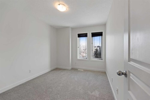 51 Legacy Close Se, Calgary, AB - Indoor Photo Showing Other Room