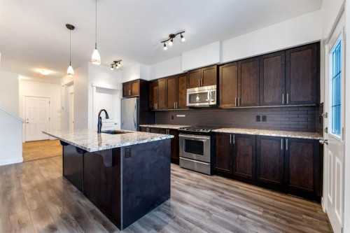 51 Legacy Close Se, Calgary, AB - Indoor Photo Showing Kitchen With Stainless Steel Kitchen With Upgraded Kitchen