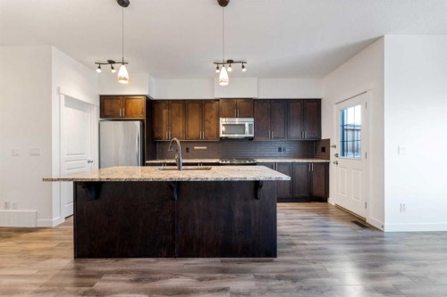 51 Legacy Close Se, Calgary, AB - Indoor Photo Showing Kitchen With Upgraded Kitchen