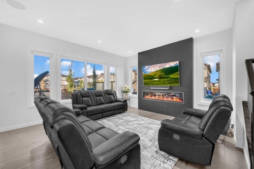 134 Corner Meadows Common Ne, Calgary, AB - Indoor Photo Showing Living Room With Fireplace