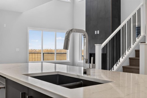 93 Walgrove Bay Se, Calgary, AB - Indoor Photo Showing Kitchen With Double Sink