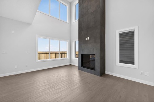 93 Walgrove Bay Se, Calgary, AB - Indoor With Fireplace