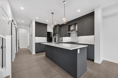 93 Walgrove Bay Se, Calgary, AB - Indoor Photo Showing Kitchen With Upgraded Kitchen
